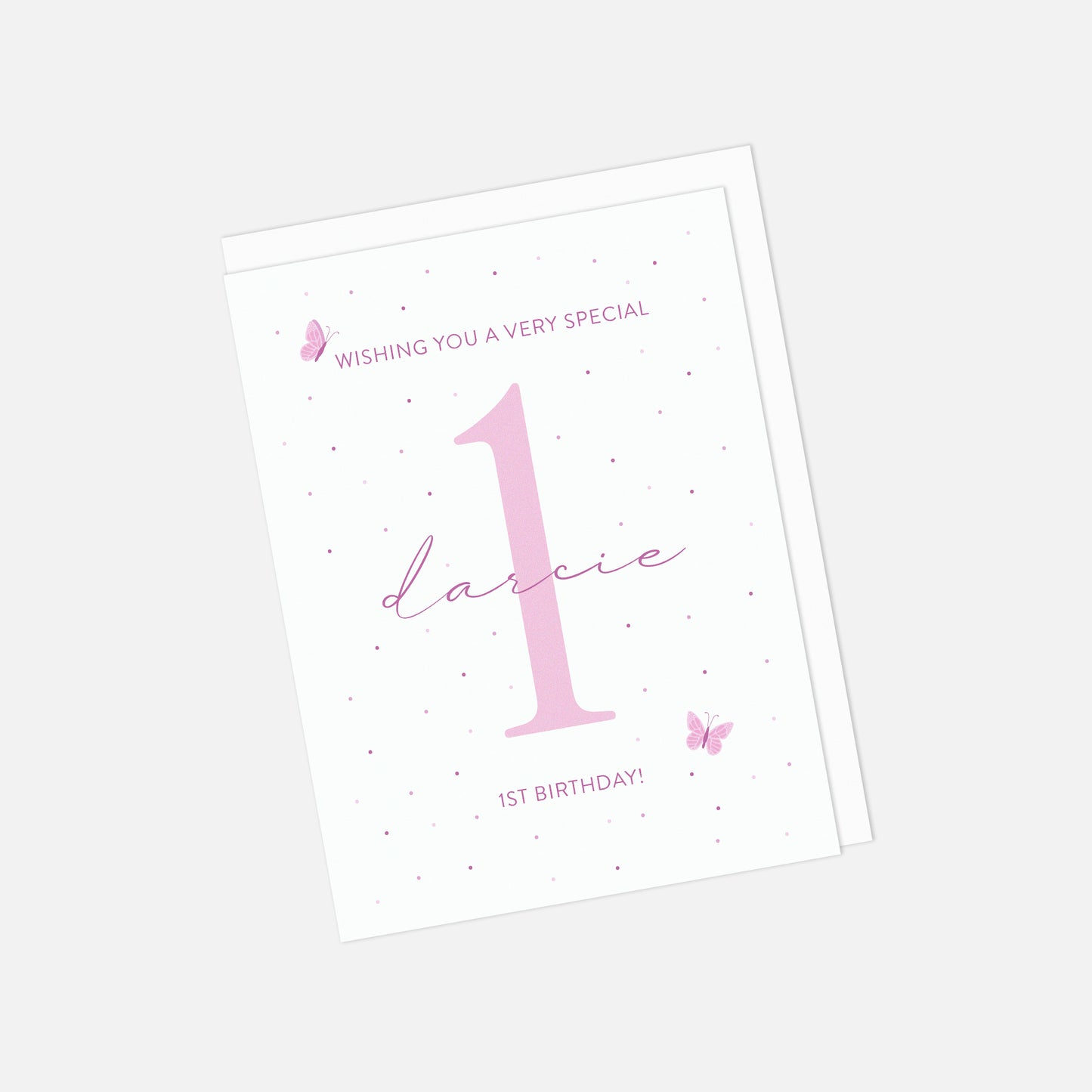 Birthday card with pink number '1' and text on a white background