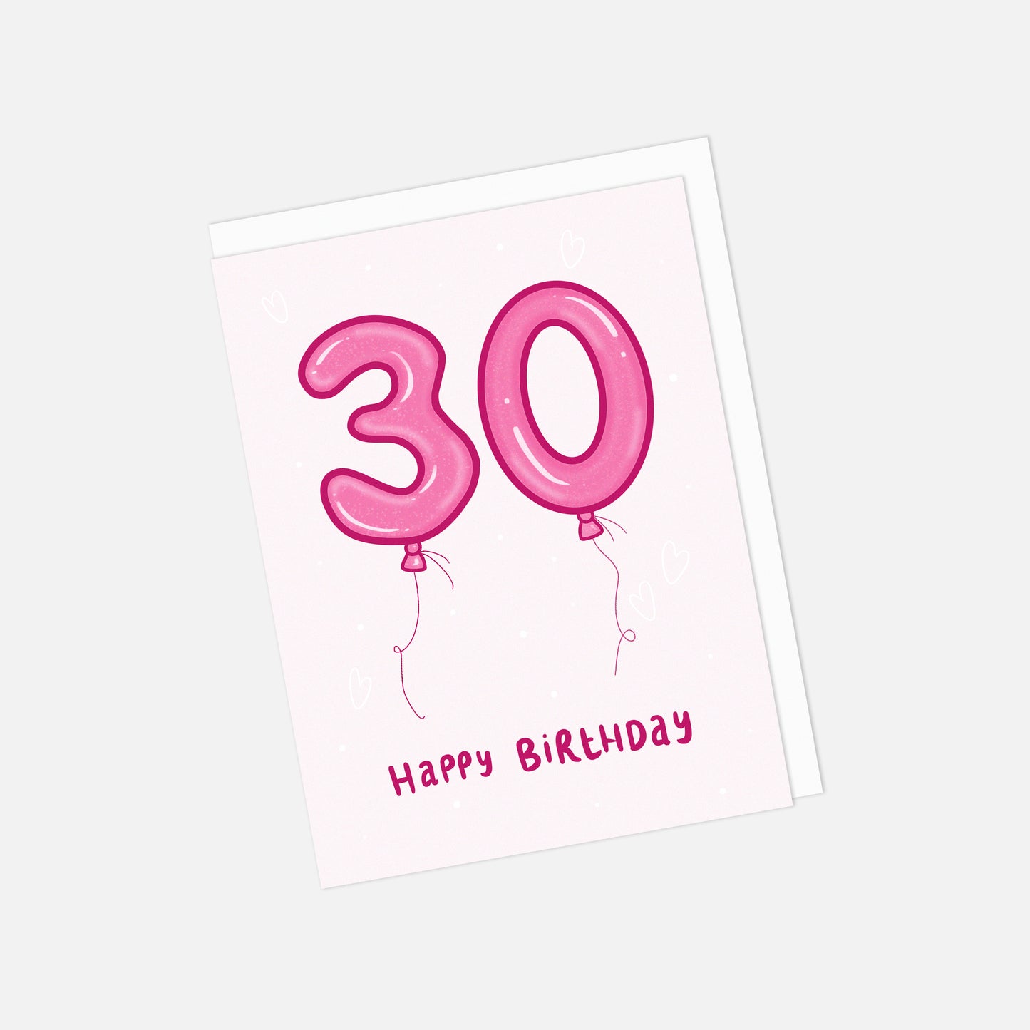 Happy Birthday card with pink balloons shaped like the number 30 on a light pink background