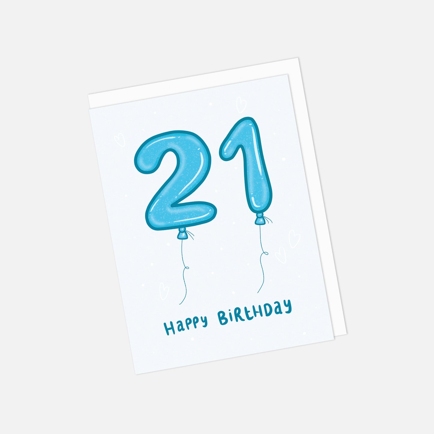 Greeting card with blue balloons shaped like the number '21' and 'Happy Birthday' text on a light gray background.
