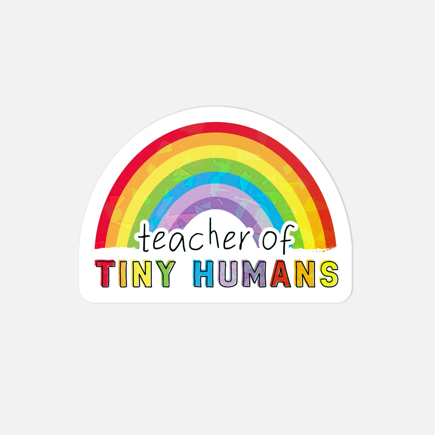 Sticker with rainbow and 'teacher of tiny humans' text on a white background