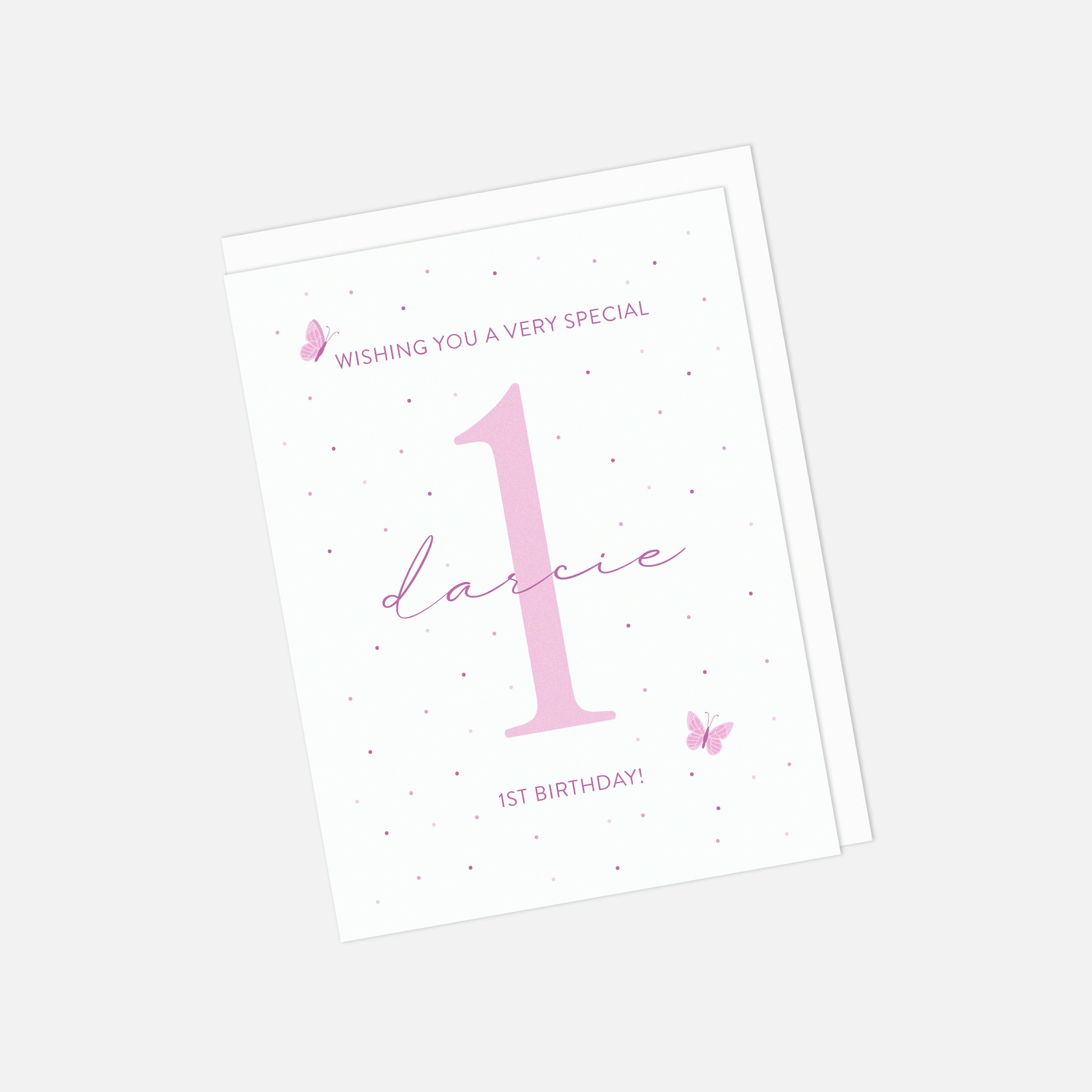 Birthday card with pink number '1' and text on a white background