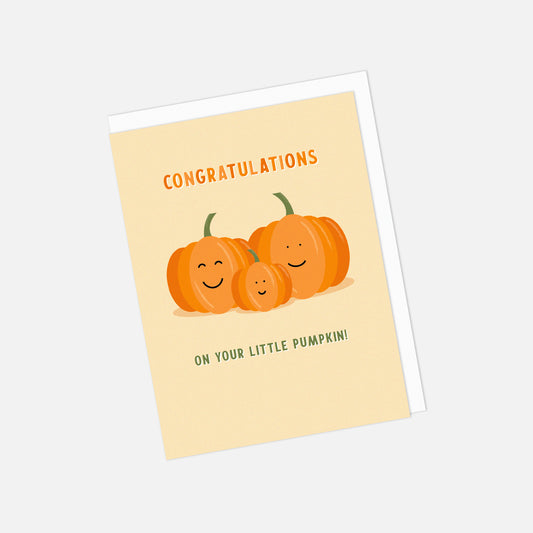 Greeting card with pumpkins and text on a beige background - congrats on your little pumpkin
