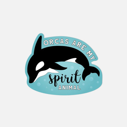 Sticker with an orca and text 'Orcas are my spirit animal' on a light blue background